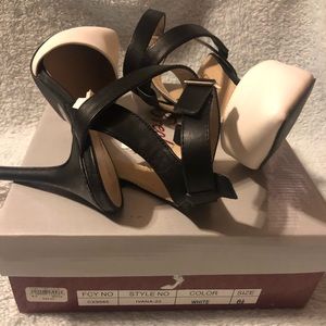 Breckelle’s black & white strap heels